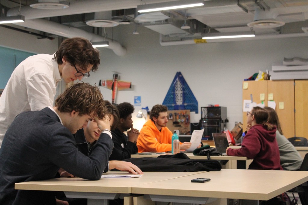 Students working together in an engineering workshop